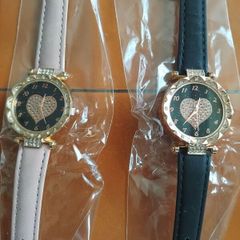 2 womens watches with leather straps
