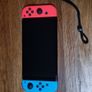 Nintendo Switch OLED Neon and accessories Image 4