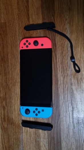 Nintendo Switch OLED Neon and accessories
