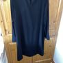 Dress M&S, black, long sleeves, very dressy, round neck with pleated detail at top. Image 4