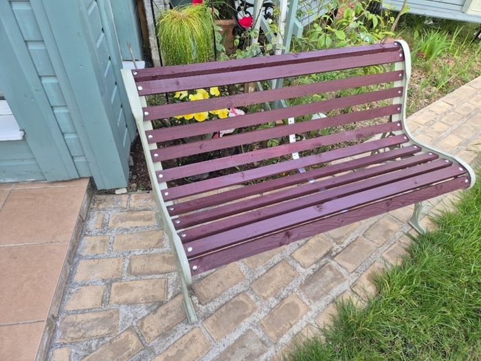 Garden bench, cast iron, beautiful design, restored seat, outdoor garden seating, treated timber decorations, furniture patio decking, great present. Ignore flowers, pots, plants, garden statue, chair, swing, patio table, balcony.