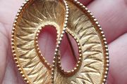 Vintage gold tone brooch.