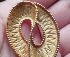Vintage gold tone brooch.