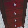 5 drawer tall dark brown dresser Image 4