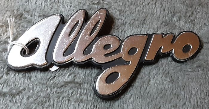 allegro car name badge