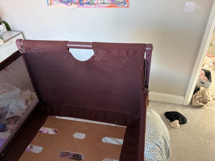 Snuzpod burgundy next to me crib