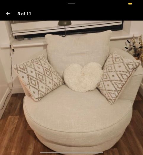 OPEN TO REASONABLE OFFERS.... PRICE DROP SWIVEL ARM CHAIR brand new with matching cushions   cost 950 selling reluctantly 450 due to moving to smaller  house