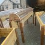 Raised beds bird feeders and cast iron benches Image 3