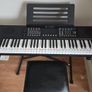 Keyboard with music stand, stand and chair. 61 keys. Barely used Image 2