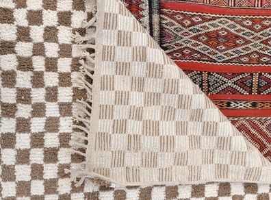 Handwoven beige checkerboard rug