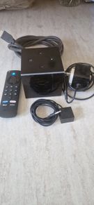 2nd gen fire tv cube. None of the current restrictions on apps/content. Works perfectly. Runs Kodi, IPTV, others apps without glitching or buffering.  Cable and remote included. Open to offers.
