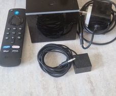 2nd gen fire tv cube. None of the current restrictions on apps/content. Works perfectly. Runs Kodi, IPTV, others apps without glitching or buffering.  Cable and remote included. Open to offers.