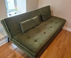 Vibrant green Swyft sofa bed couch with matching pillows (Colour not accurately reflected in own pictures, see listing for brands original pictures)