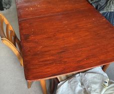 mahogany dining table and 3 chairs