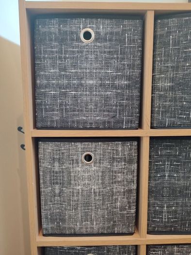 Wooden unit with fabric drawers