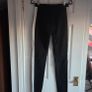 Black skinny trousers featuring contrast white side stripes, size 8 Image 3