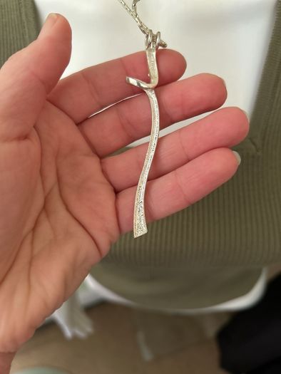 Silver tone pendant necklace
