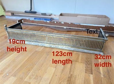 Antique brass fireplace fender