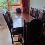 Dark Oak Dining room table and 8 leather chairs. Image 4