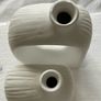 Brand new modern, hollow-center white ceramic/porcelain decorative donut-shaped vases. Image 3