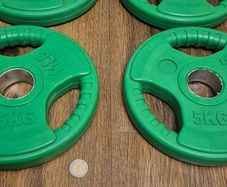 brand new 4x5kilo coloured olympic weight plates