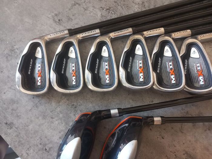 Dunlop golf clubs and bag with stand. Right handed clubs.