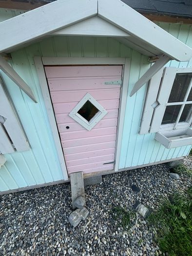 wooden outdoor playhouse
