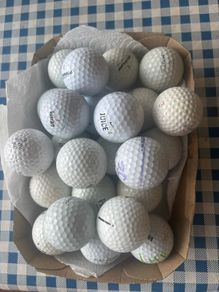 Two Dozen Golfballs. (Used)