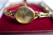 Women's Timex dress watch. Gold opalescent face. Water resistant Quartz Watch (works well