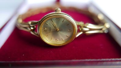 Women's Timex dress watch. Gold opalescent face. Water resistant Quartz Watch (works well