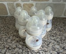 12 Baby Bottles (MAM and Tommee Tippee)