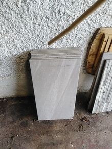 10 large grey tiles make reasonable  offer ther yours