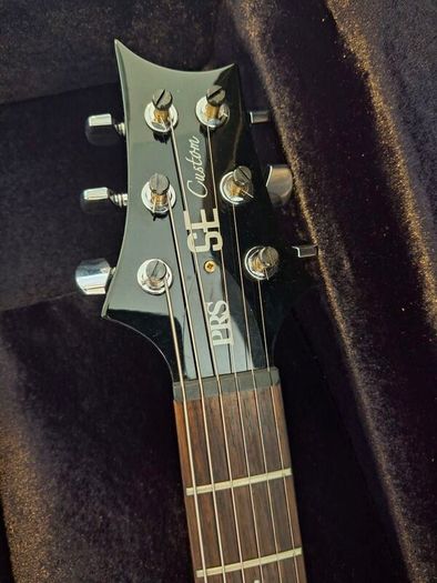 PRS-SE Custom 24 upgraded with Tremonti Bass and Treble Pickups and locking tuners.
