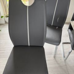 4 Grey faux leather dining chairs