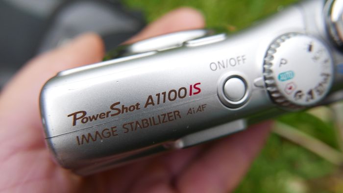 Canon PowerShot A1100 IS 12.1MP Digital Camera - Silver Tested Works well