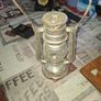 Beautiful Old Hurricane Lantern, Post Available, The lantern features a central glass globe protected by a metal cage, designed to shield the flame from wind while providing light Image 2