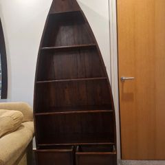 Wooden boat-shaped bookcase with two drawers