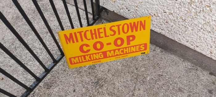 Mitchelstown hay barn advertising,sign by currans of Clonmel,,original ,came out of the offices in mitchelstown branch ,,,few marks  ,lovely advertising display item, for any garage ,man cave or personal collection, sold as is