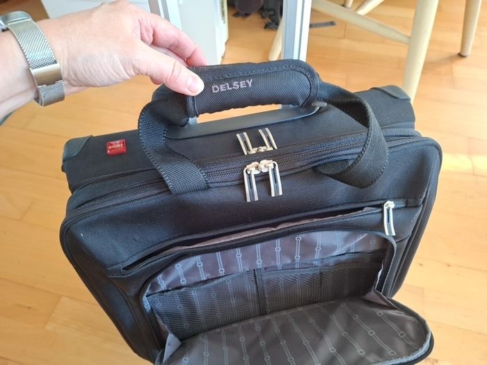 Delsey wheelie suitcase.