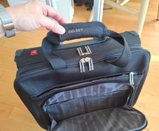 Delsey wheelie suitcase.