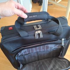 Delsey wheelie suitcase.