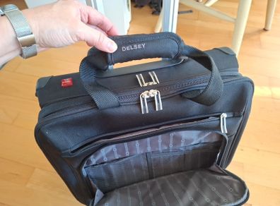 Delsey wheelie suitcase.