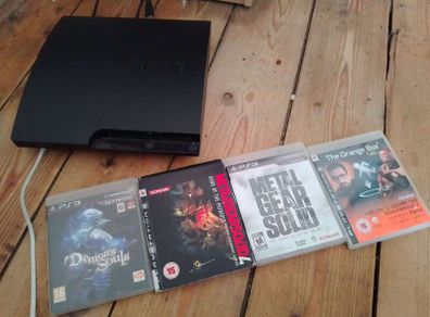 Modded PS3 Slim + games