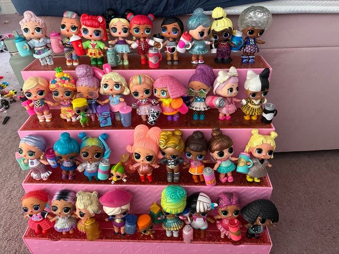 LOL Display Stand and 34 dolls