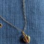 Kids gold chain and hold heart pendant Image 3