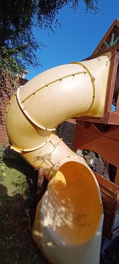 Garden playhouse slide swing