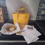 Genuine Michael Kors mini tote ( Sunshine) Jet Set Travel Saffiano Leather. Image 2