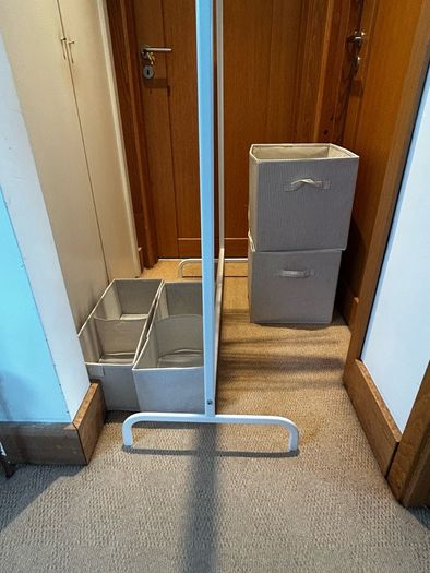 Clothing rail, hangers and storage boxes