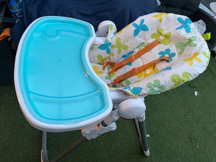 Adjustable reclining high chair