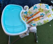 Adjustable reclining high chair